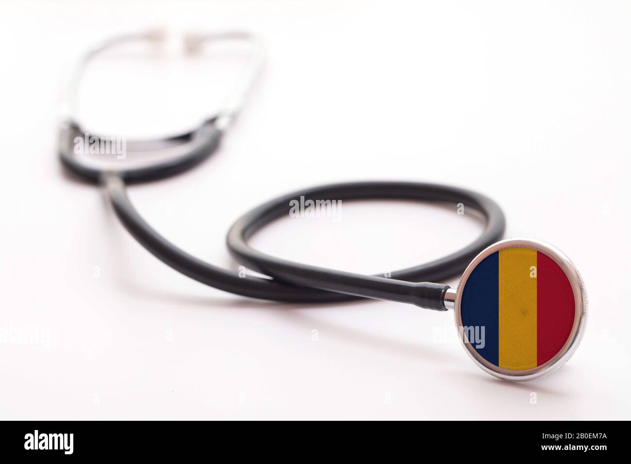 Romania concetto di assistenza sanitaria. Stetoscopio medico con bandiera del paese Foto Stock