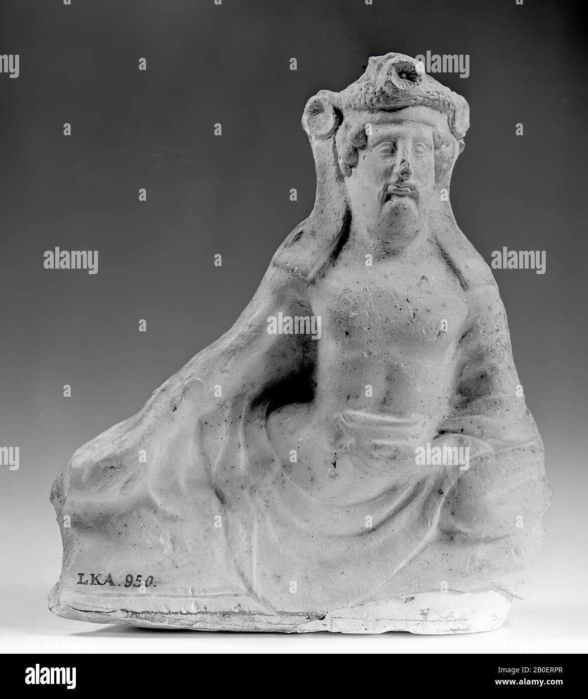 Classica figurina di terracotta classica del sud dell'uomo adiacente Foto Stock