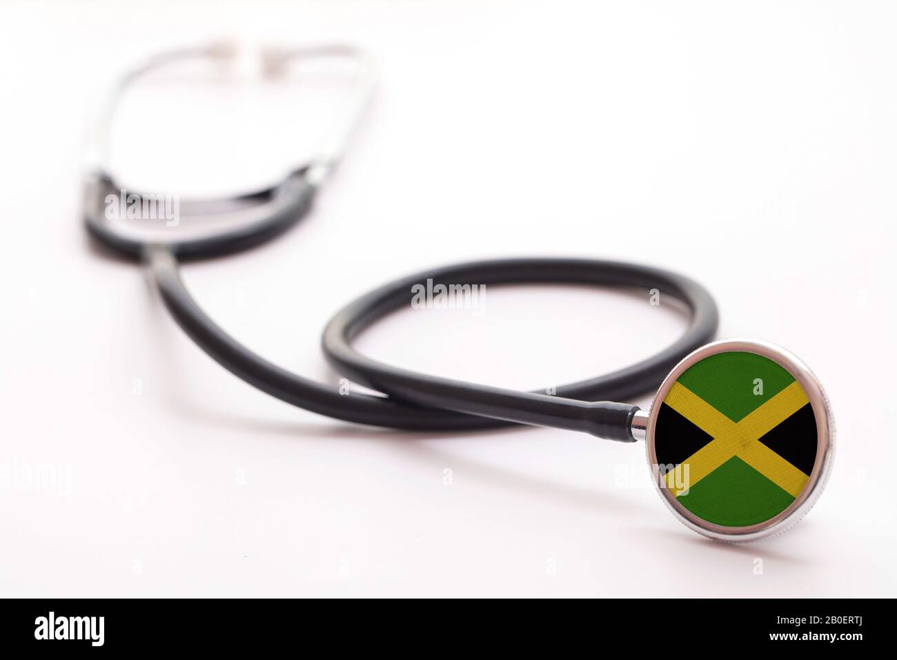 Giamaica concetto di assistenza sanitaria. Stetoscopio medico con bandiera del paese Foto Stock