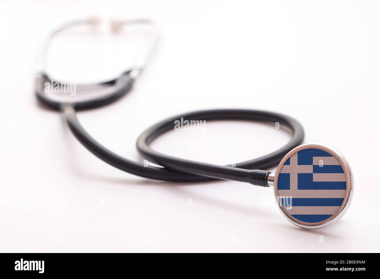 Grecia concetto di assistenza sanitaria. Stetoscopio medico con bandiera del paese Foto Stock