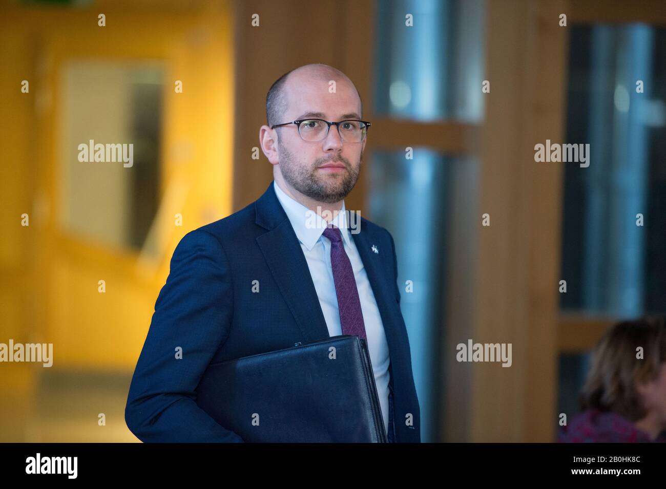 Edimburgo, Regno Unito. 20 Febbraio 2020. Scene del Parlamento scozzese. Nella foto: Ben Macpherson MSP - recentemente nominato Ministro delle finanze pubbliche ed ex Ministro per l'Europa, la migrazione e lo sviluppo internazionale Foto Stock