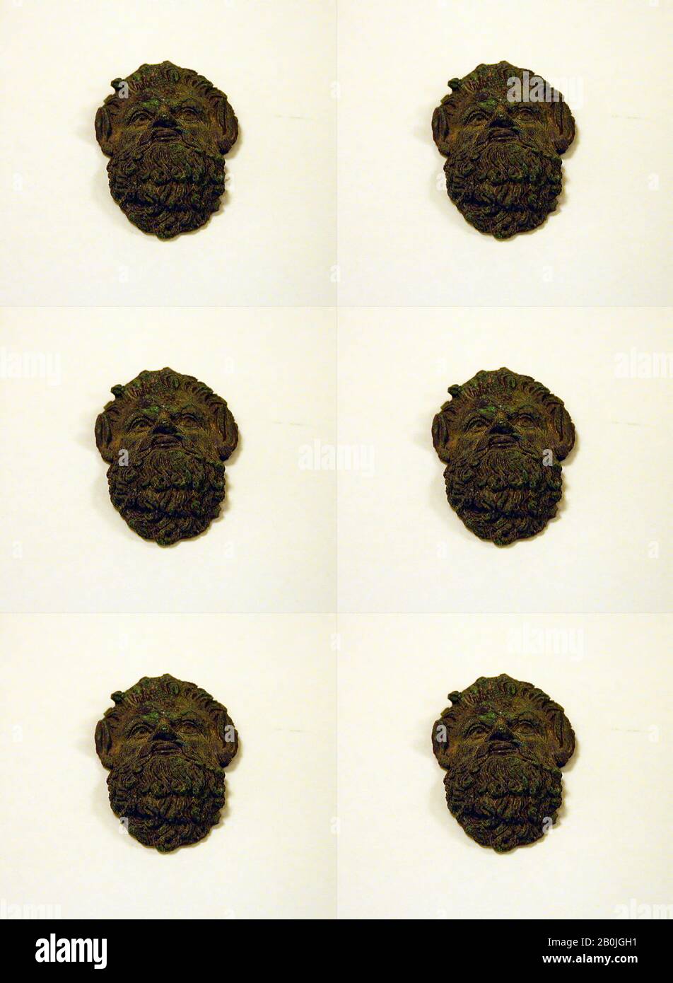 Attacco manico in bronzo sotto forma di maschera satiro, greco, ellenistico, Data 2nd secolo a.C., greco, bronzo, H.: 2 1/8 in. (5,4 cm), Bronzes Foto Stock