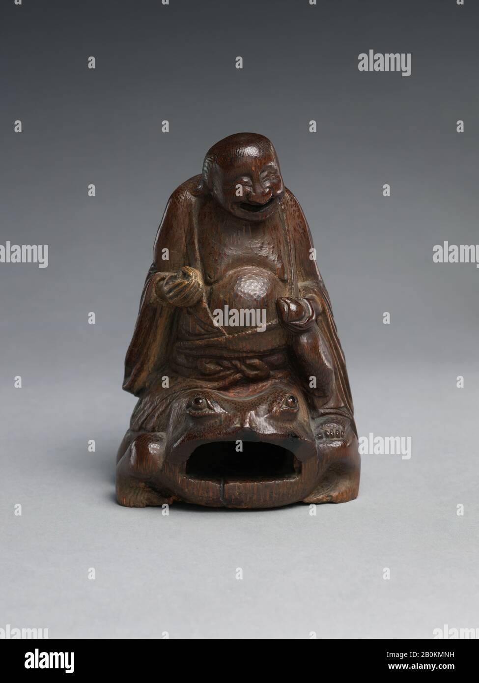 Immortale Liu Hai cavalcare un toad, Cina, dinastia Qing (1644–1911), Data 18th–19th secolo, Cina, Bamboo, H. 4 3/8 in. (11,1 cm)" W. 3" (7,6 cm); D. 3" (7,6 cm), scultura Foto Stock
