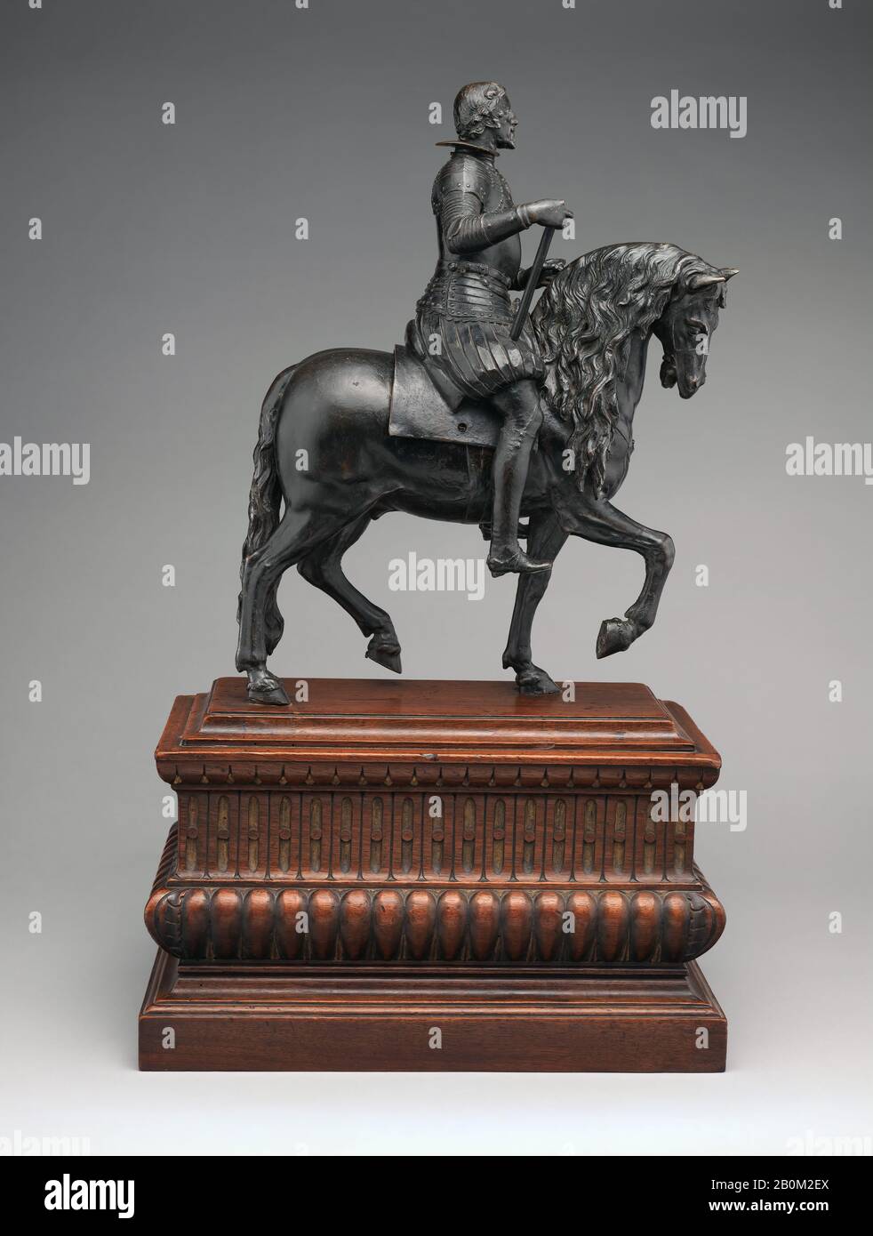 Forse dopo un modello di Pietro Tacca, statuetta equestre di Filippo IV, Re di Spagna (1605–1665), italiano, Forse dopo un modello di Pietro Tacca (italiano, Carrara 1577–1640 Firenze), 17th secolo, cast forse 19th secolo, italiano, Bronzo, Cavallo e cavaliere: 16 1/8 × 7 × 12 5/8 in. (41 × 17,8 × 32,1 cm), Rider (a): 12 3/8 × 7 × 5 1/8 in. (31,4 × 17,8 × 13 cm), Cavallo (b): 12 × 5 5/8 × 12 5/8 in. (30,5 × 14,3 × 32,1 cm), base: 9 × 7 3/4 × 15" (22,9 × 19,7 × 38,1 cm), scultura-bronzo Foto Stock