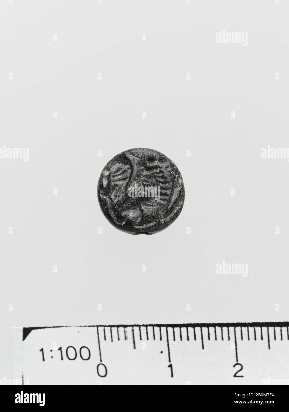 Guarnizione lentoide in steatite, Minoan, Late Minoan IIIA-B, Data ca. 1400-1200 a.C., Minoan, steatite, Diametro 1,27 cm, Gemme Foto Stock