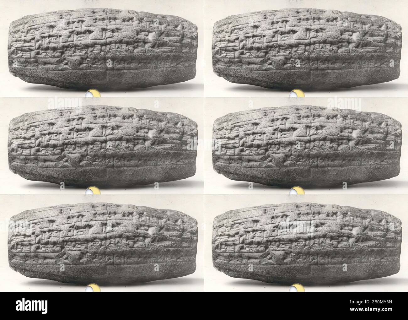 Cilindro cuneiforme con iscrizione di Nebukadnetsar II che descrive la ricostruzione del tempio della dea madre Ninmah/Belet-ili a Babilonia, Babylonian, Neo-Babylonian, Data ca. 604–562 a.C., Mesopotamia, Babilonia (?) (moderna Hillah), Babilonia, argilla, 4,38 x 2 pollici. (11,1 x 5,2 cm), Con Iscrizione Clay-Tablets Foto Stock