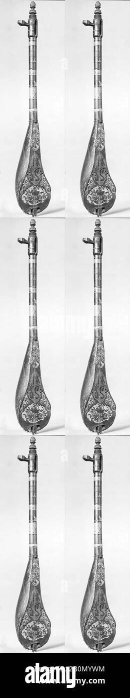 Guennri, egiziano, fine 19th secolo, Cairo, Egitto, egiziano, legno e pergamena., L. 69.9 (27-1/2 in.), W. 12.7 cm (5 in.), Chordophone-Lute-plucked-unfreted Foto Stock