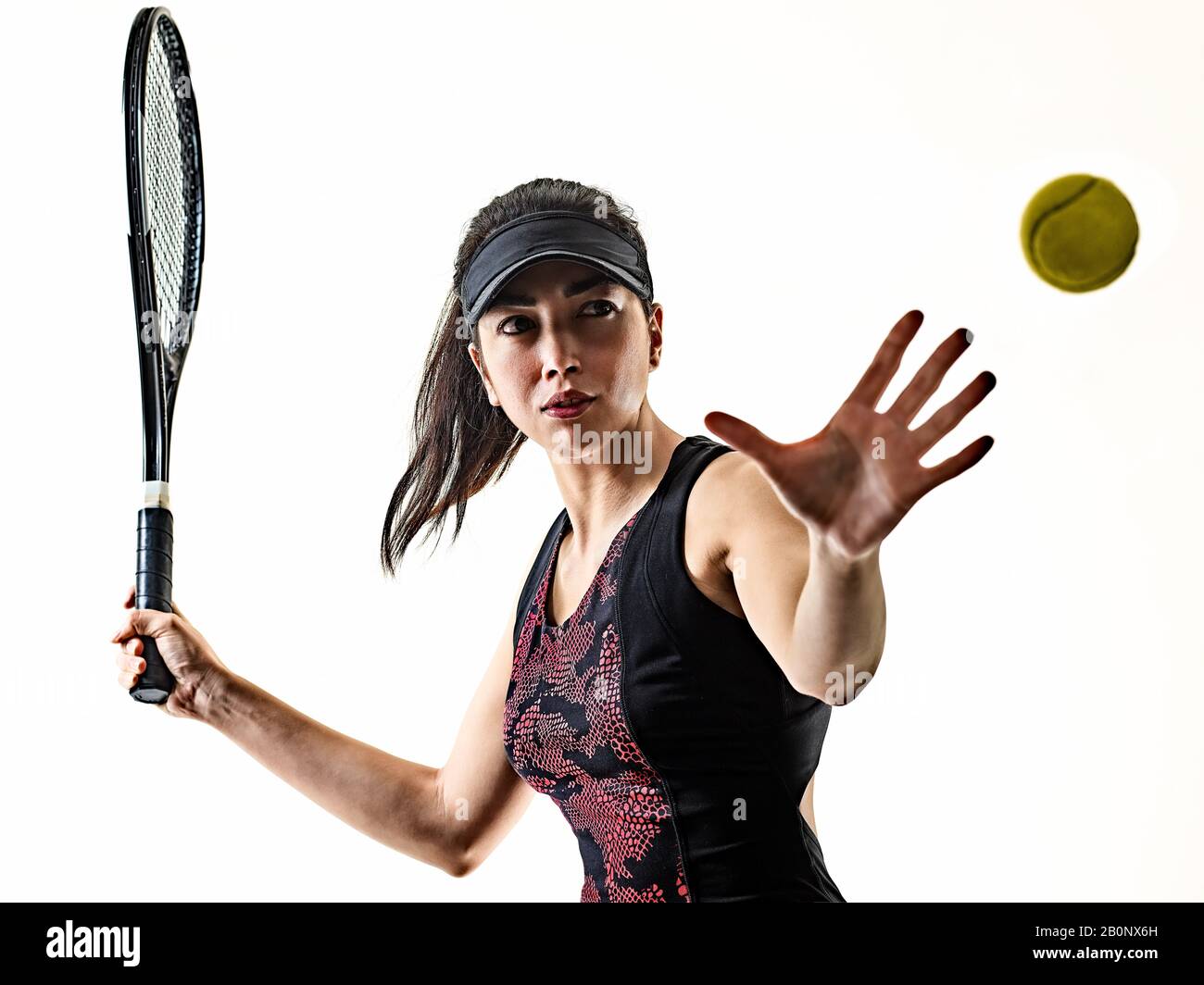 un giovane giocatore di tennis asiatico donna isolata in studio silhouette su brackground bianco Foto Stock