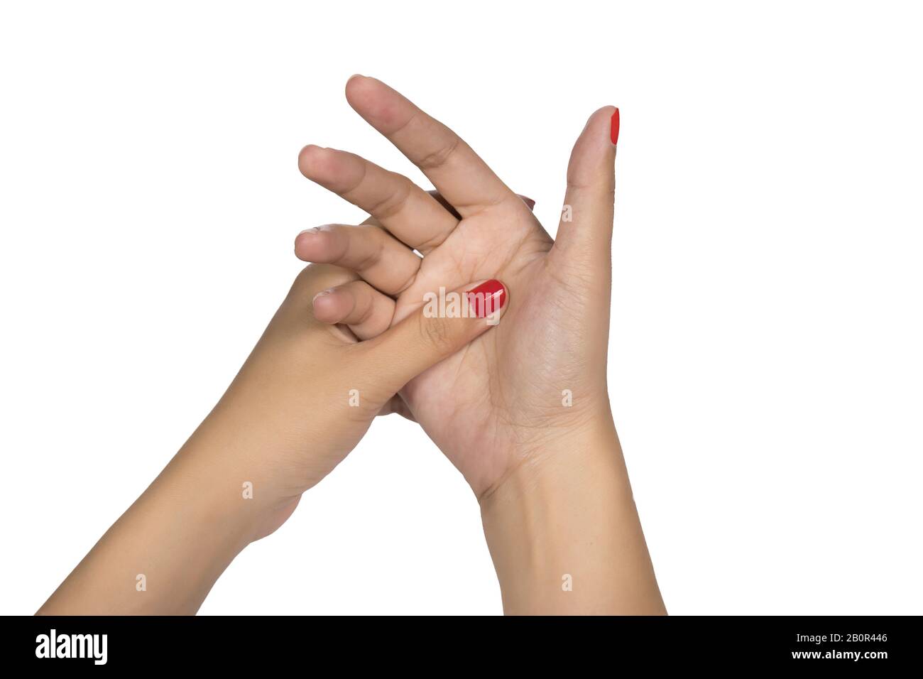 Donna dito mano con chiodo rosso. Pulsante manuale blocco dita concetto sano sfondo bianco Foto Stock