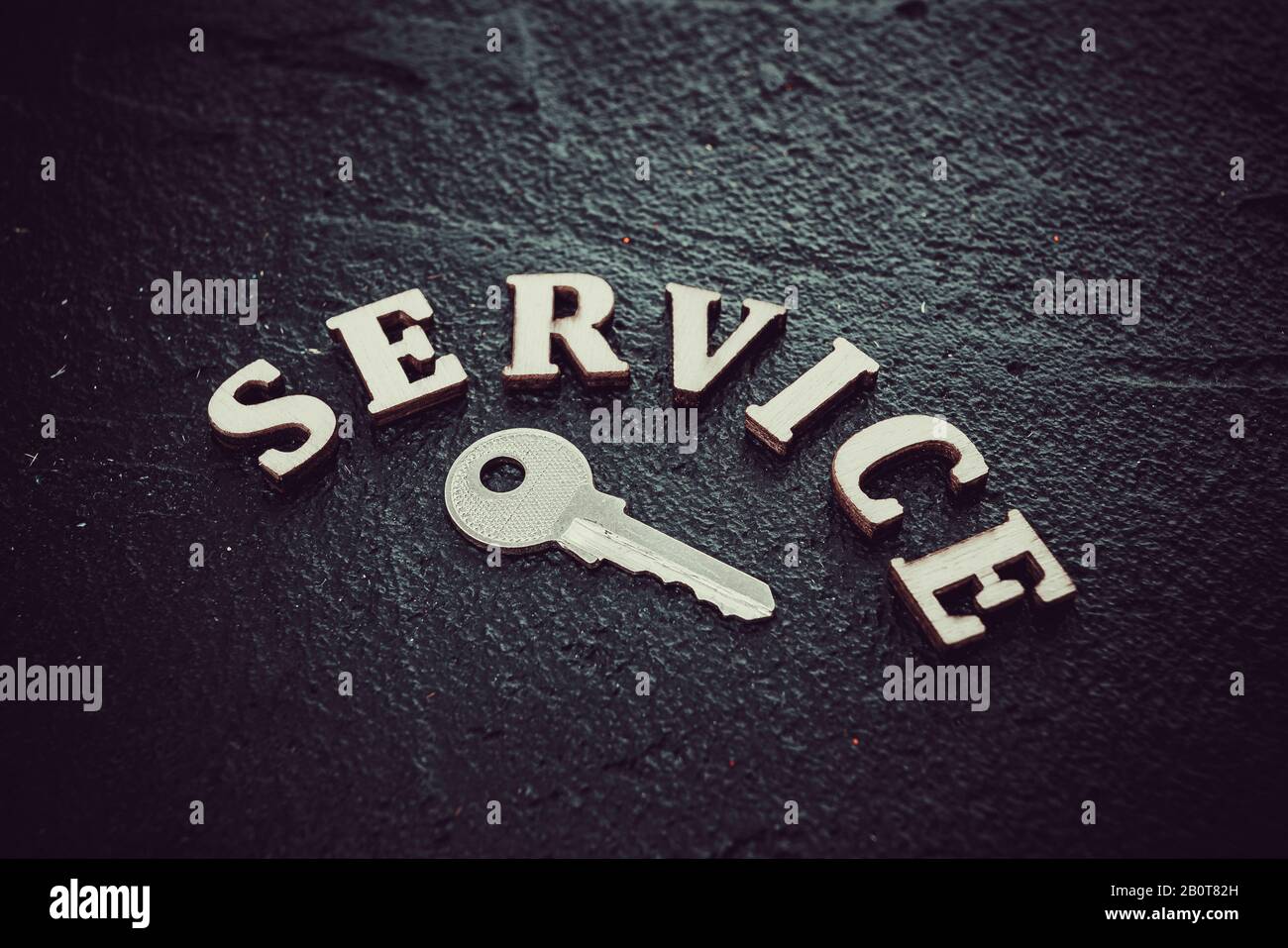parola chiave di servizio su sfondo nero Foto Stock
