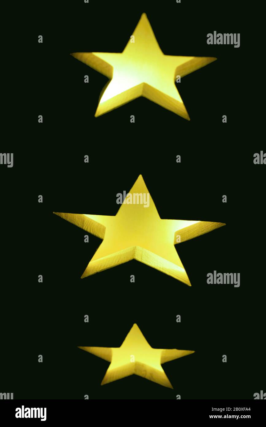 Lichtspiel mit gelben Sternen Foto Stock
