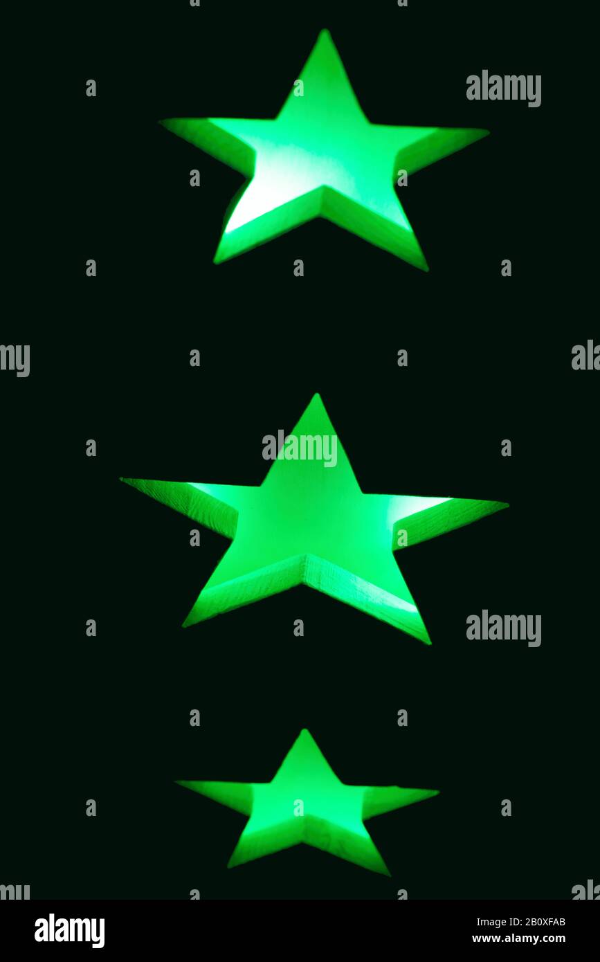 Lichtspiel mit grünen Sternen Foto Stock