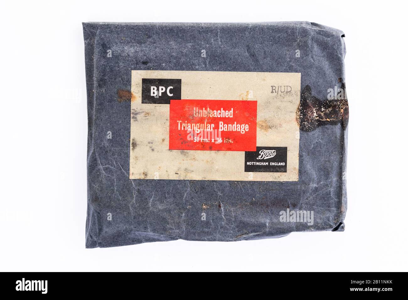 Bendaggio vecchio nel suo involucro originale Foto Stock