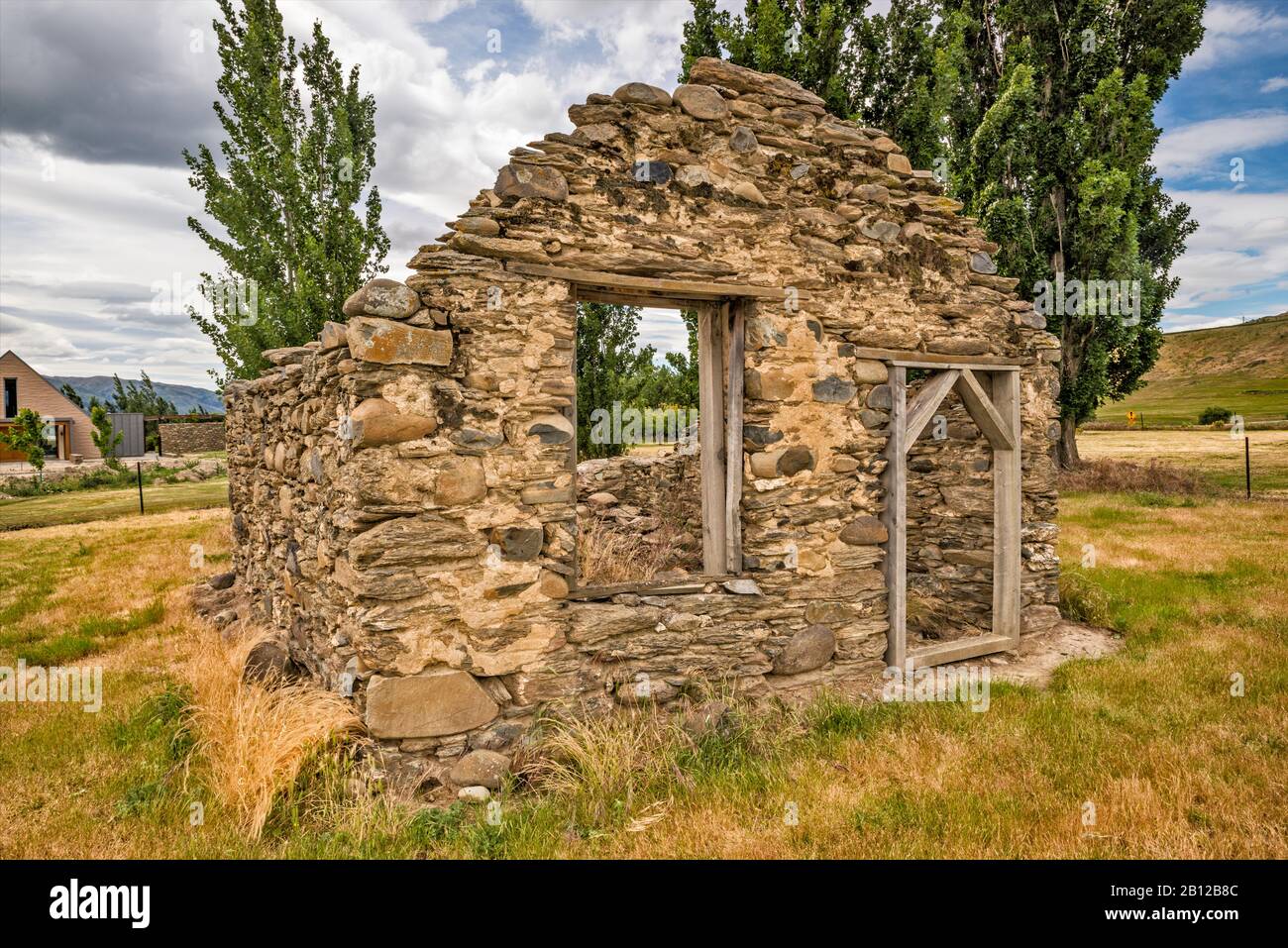 Scott's Bakery, rovina del bakehouse nella valle del fiume Clutha, aperto durante la corsa dell'oro di Otago, la strada di anello di Bendigo, la regione di Otago, l'isola del sud, la Nuova Zelanda Foto Stock