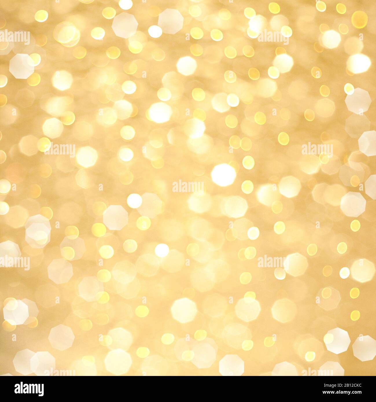Astratto oro bokeh sfondo, incandescente Natale vacanza luci texture Foto Stock