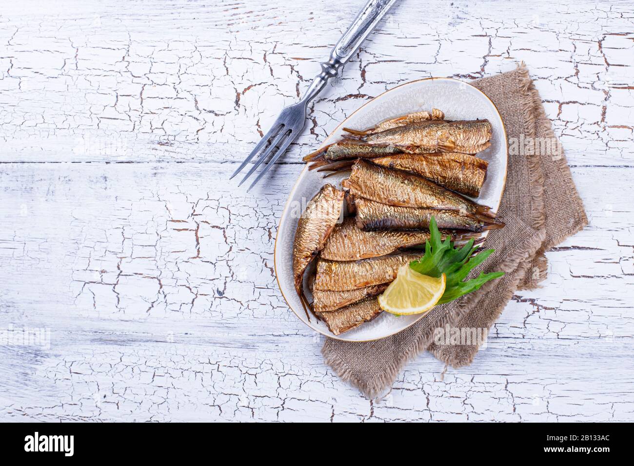 Spratti affumicati in scatola nell'olio Foto Stock