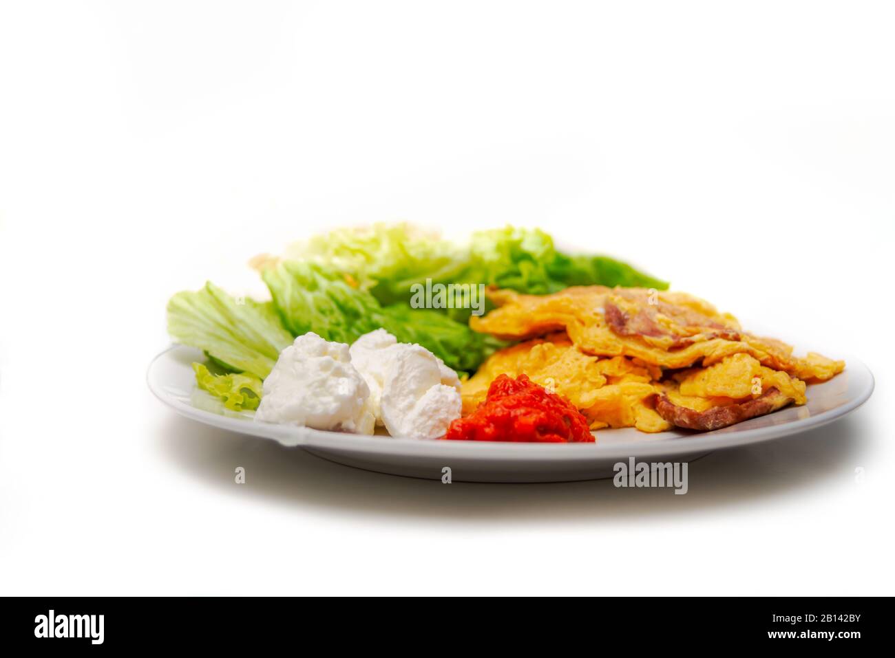 Uova con succo di limone che fanno colazione fatta in casa Foto Stock