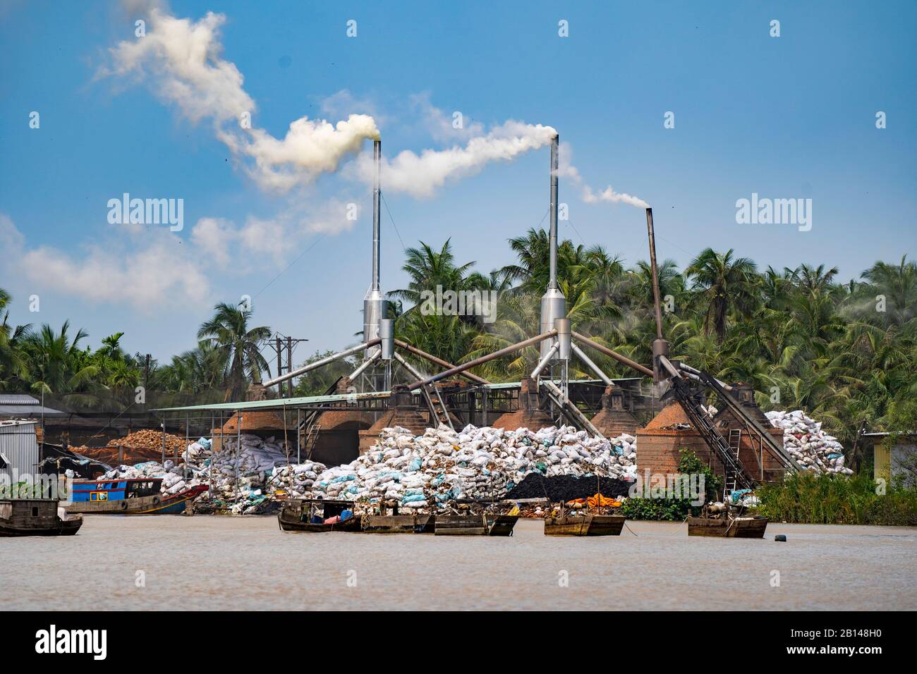 Fabbrica di cocco nel Delta del Mekong, Vietnam Foto Stock