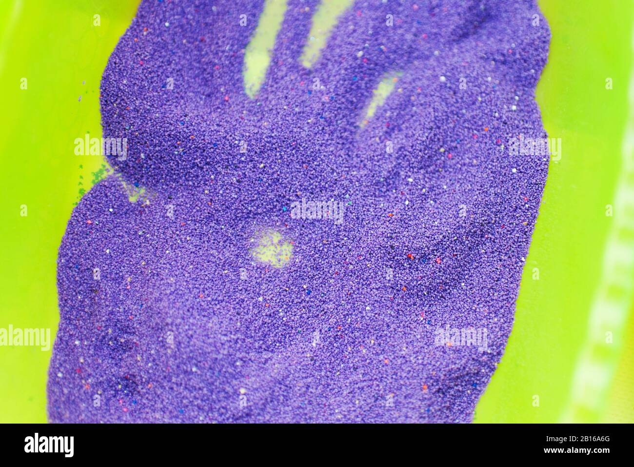 Sabbia decorativa viola Foto Stock