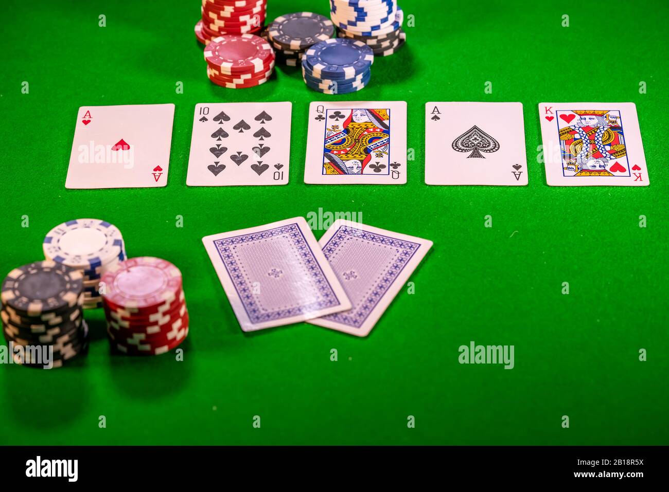 16 il fiume (quinta strada) in un gioco di poker Texas Holdem Foto Stock