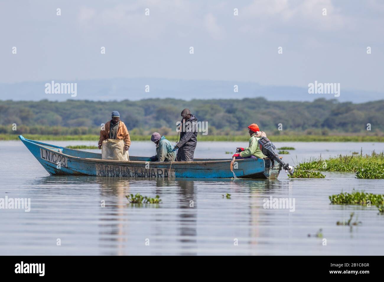 Pescatori sul lago Naivasha, un lago d'acqua dolce in Kenya, vicino Nakuru, a nord ovest di Nairobi nella Grande Rift Valley Foto Stock
