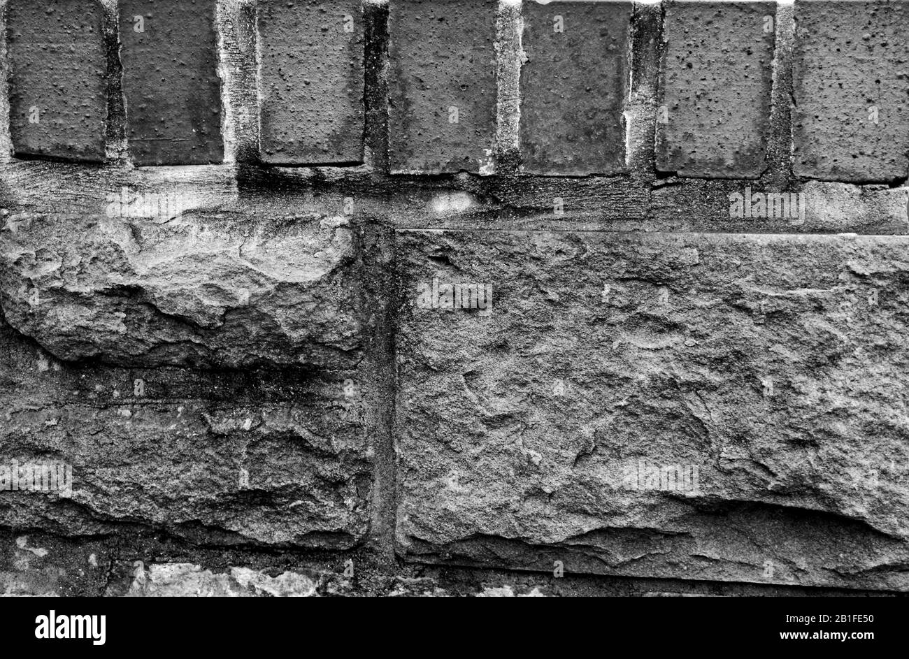 Primo piano di un vecchio muro di mattoni Foto Stock