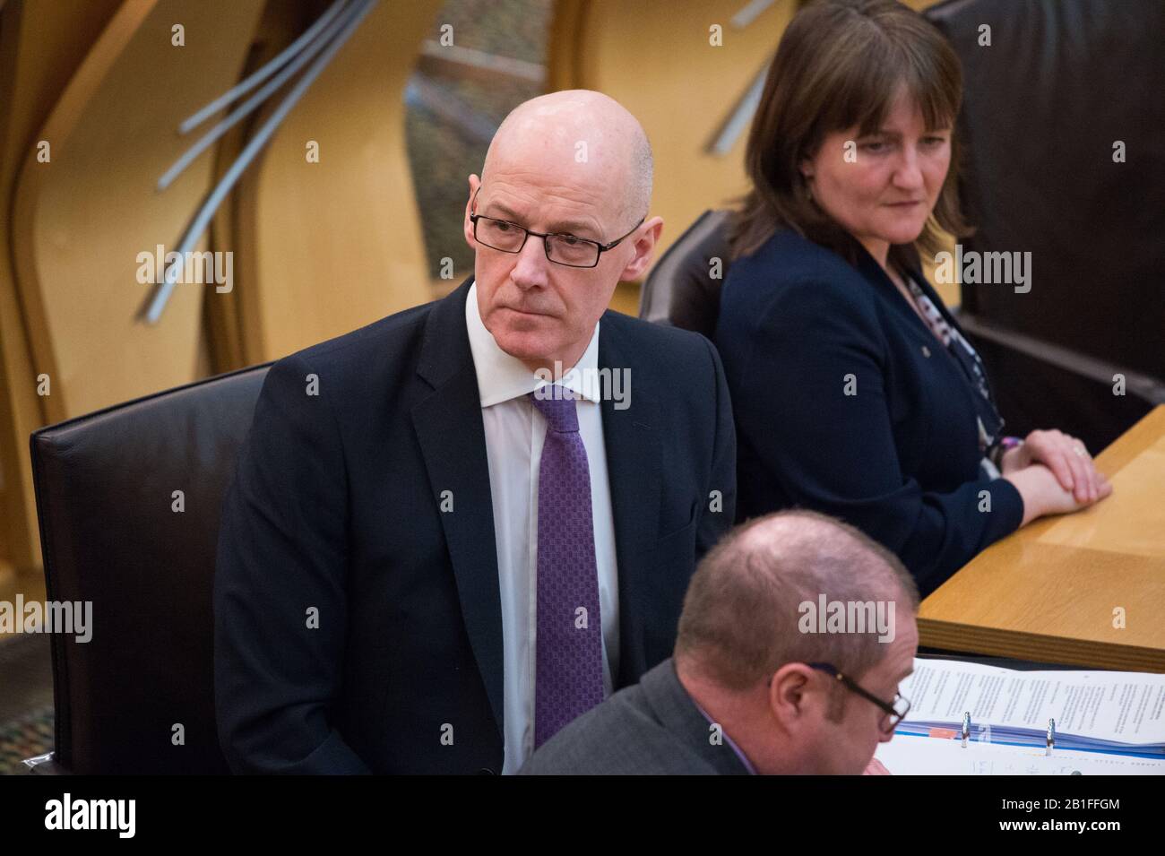 Edimburgo, Regno Unito. 25th Feb, 2020. Nella foto: John Swinney MSP - primo Ministro e Ministro del governo della pubblica istruzione per il partito nazionale scozzese (SNP). John Swinney risponde alla domanda S5T-02035 presentata dalla Iain Gray del partito laburista scozzese: Chiedere al governo scozzese in che modo l'analisi recentemente pubblicata del conseguimento dell'esame SQA influenzerà il mandato della sua revisione dell'istruzione secondaria. Credito: Colin Fisher/Alamy Live News Foto Stock
