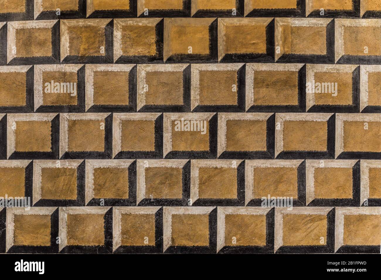 Bella facciata dipinta decorazione su un castello muro. Grunge aspetto. Foto Stock