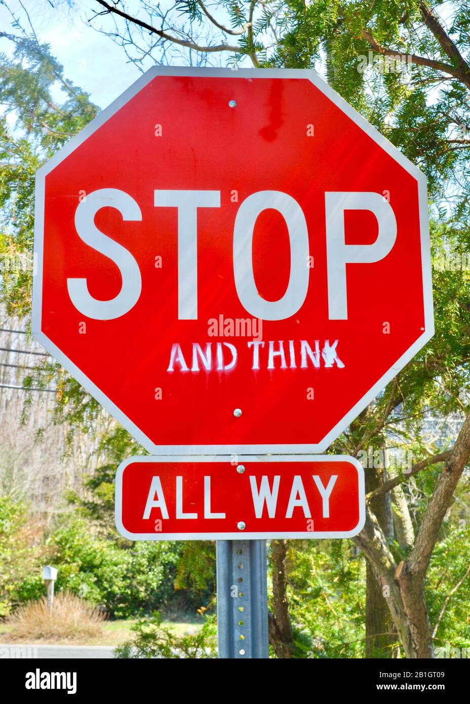 Un segno di stop che ti fa pensare. Foto Stock