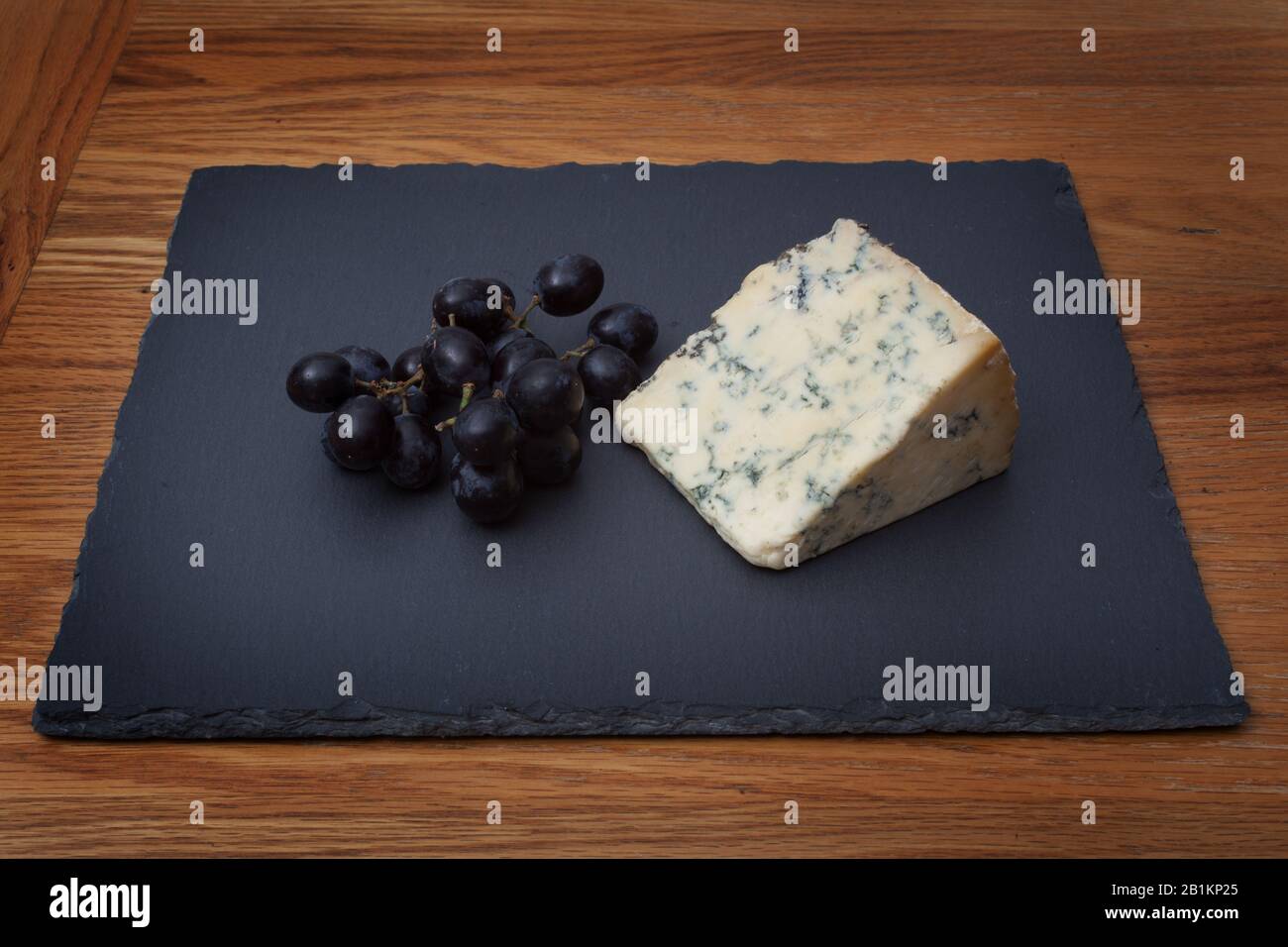 Stilton Blue Cheese Con Uva Sable Foto Stock