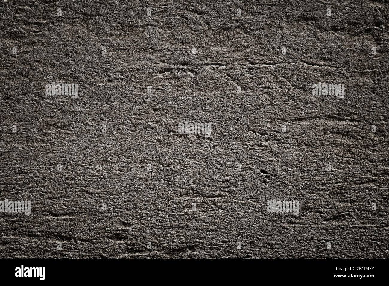 Texture grintosa scura - motivo della superficie della parete grungy. Foto Stock