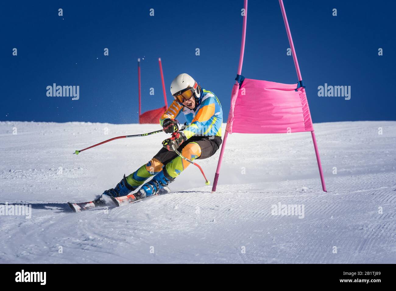 atleta in gara di sci alpino Foto Stock