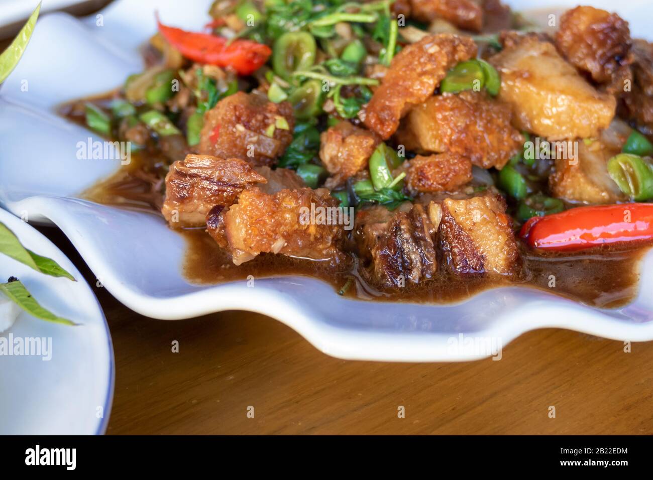 Piatto di carne di maiale e pepe in stile thailandese Foto Stock