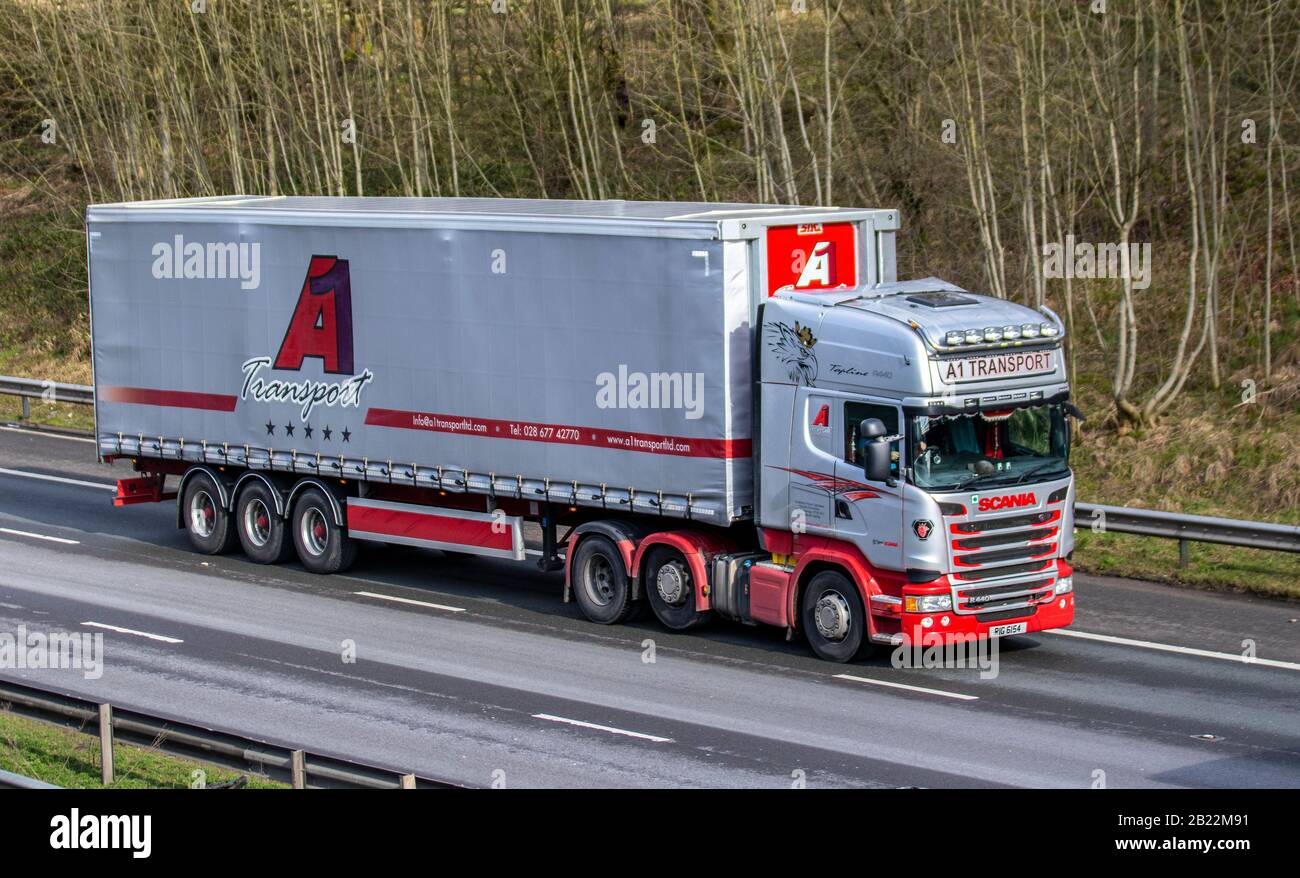 TRASPORTO A1; camion di trasporto, camion, trasporto, camion, cargo carrier, veicolo, trasporto commerciale europeo, industria, M61 a Manchester, Regno Unito Foto Stock
