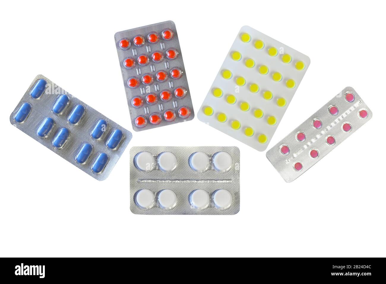 Pillole di diversi colori in blister, isolato su sfondo bianco Foto Stock