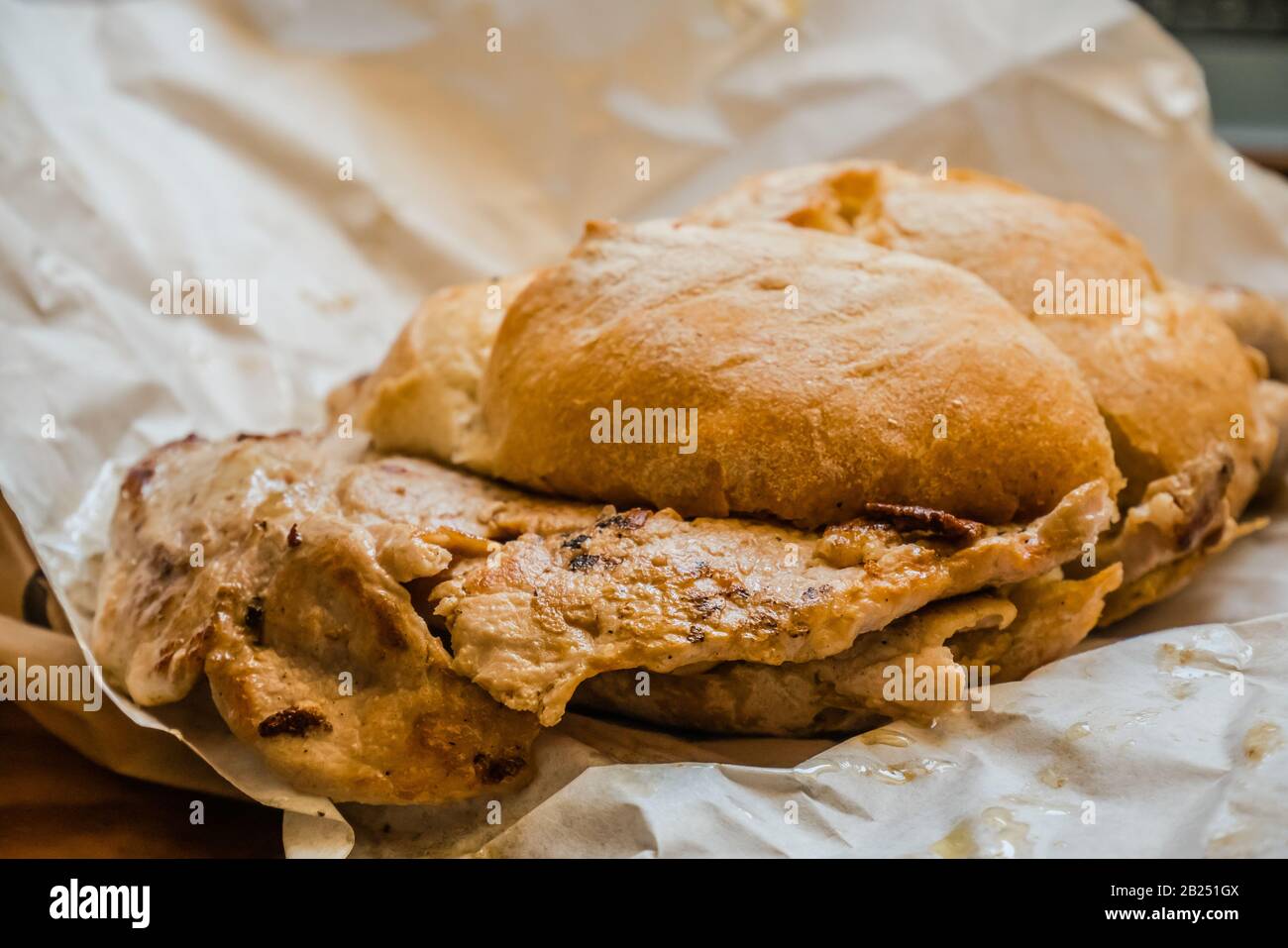 Famoso spuntino portoghese alla griglia di maiale sandwich Foto Stock