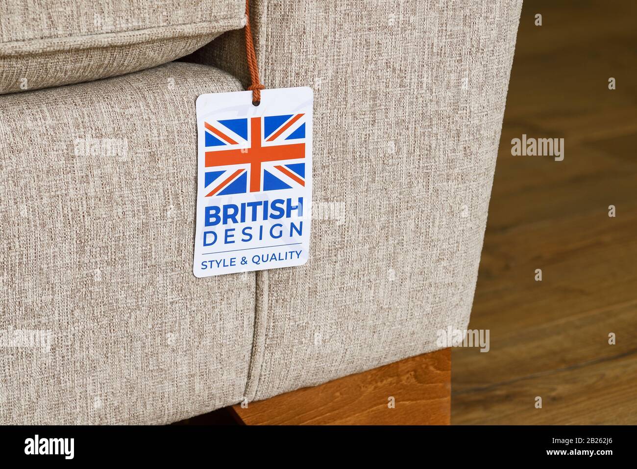 Etichetta British Design su un divano Foto Stock