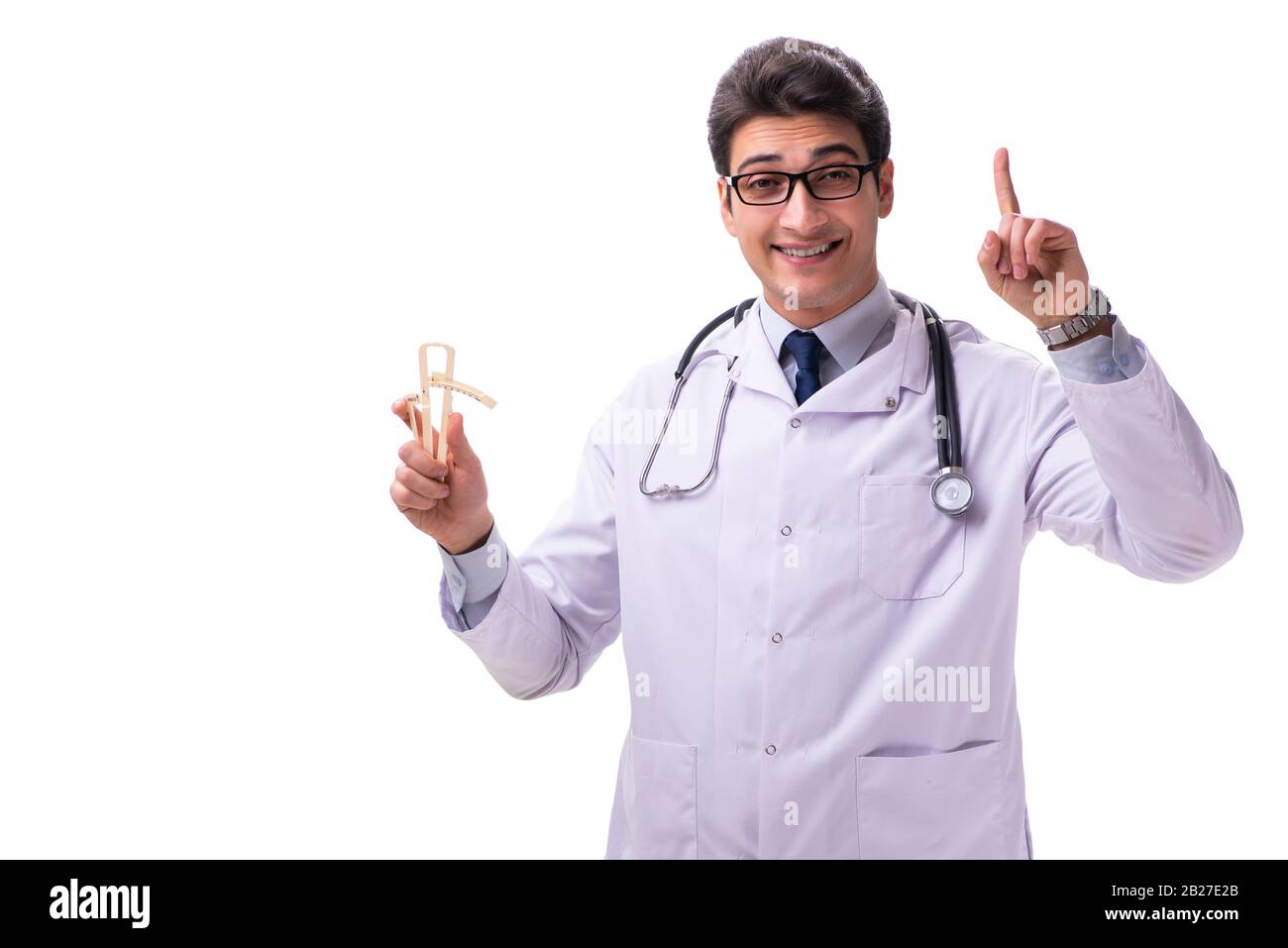 Il giovane maschio medico con calibri isolato su bianco Foto Stock