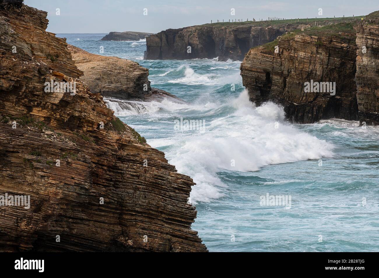 Onde che si infrangono Foto Stock