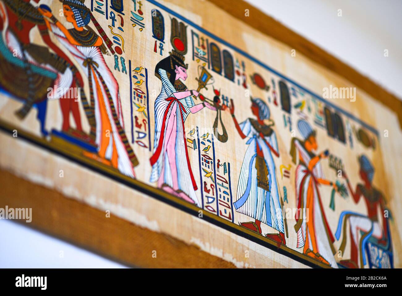 Pittura egiziana su vecchia carta pergamena. Foto Stock
