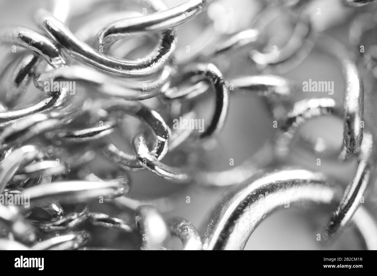 Macro. Le catene fotografiche in bianco e nero si chiudono a schermo intero. Foto Stock