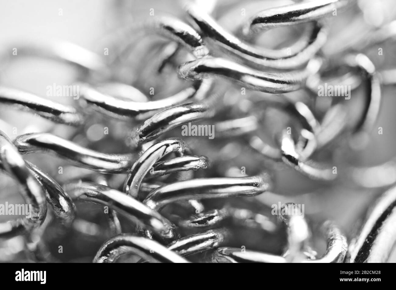 Macro. Le catene fotografiche in bianco e nero si chiudono a schermo intero. Foto Stock