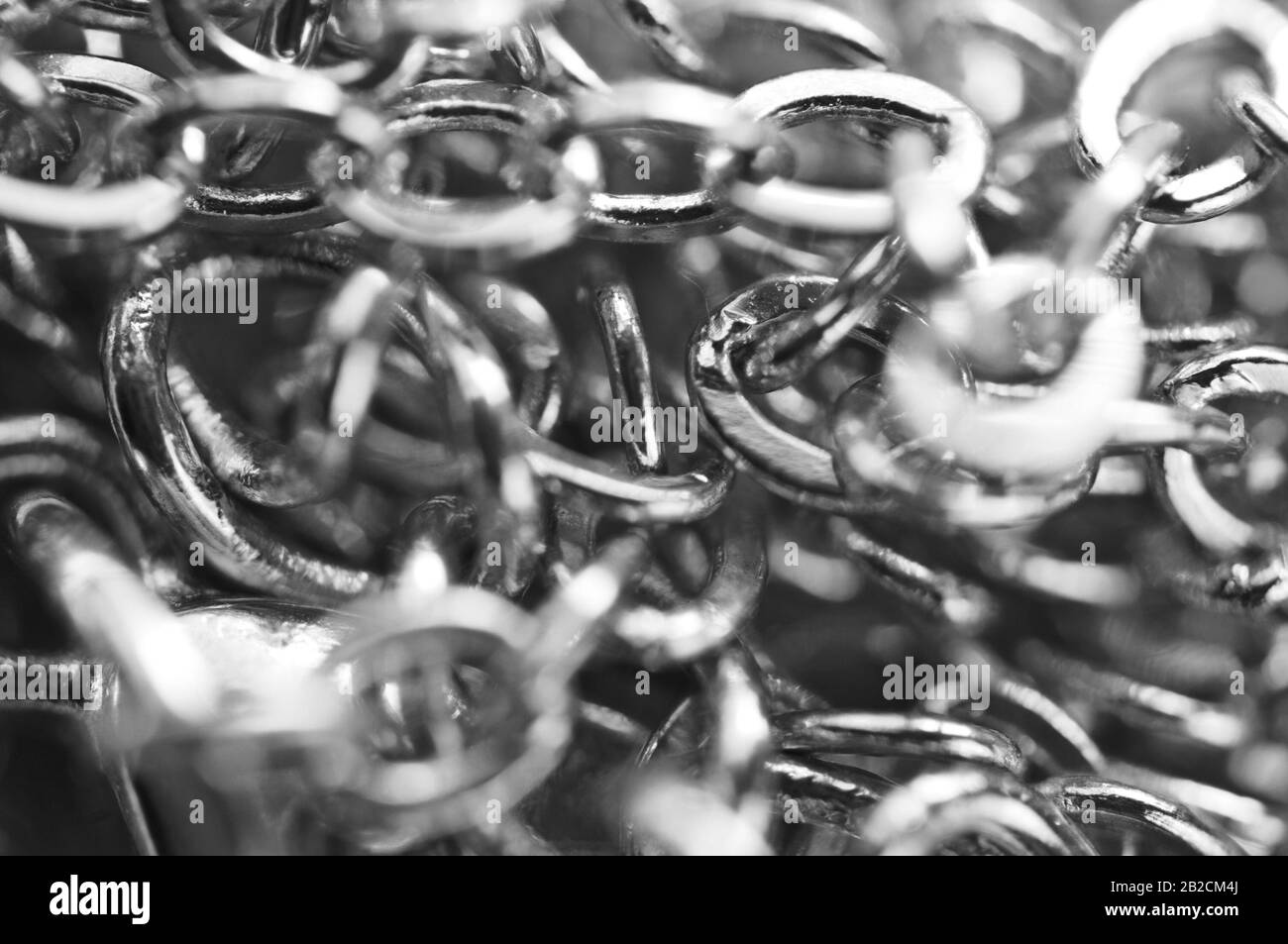 Macro. Le catene fotografiche in bianco e nero si chiudono a schermo intero. Foto Stock