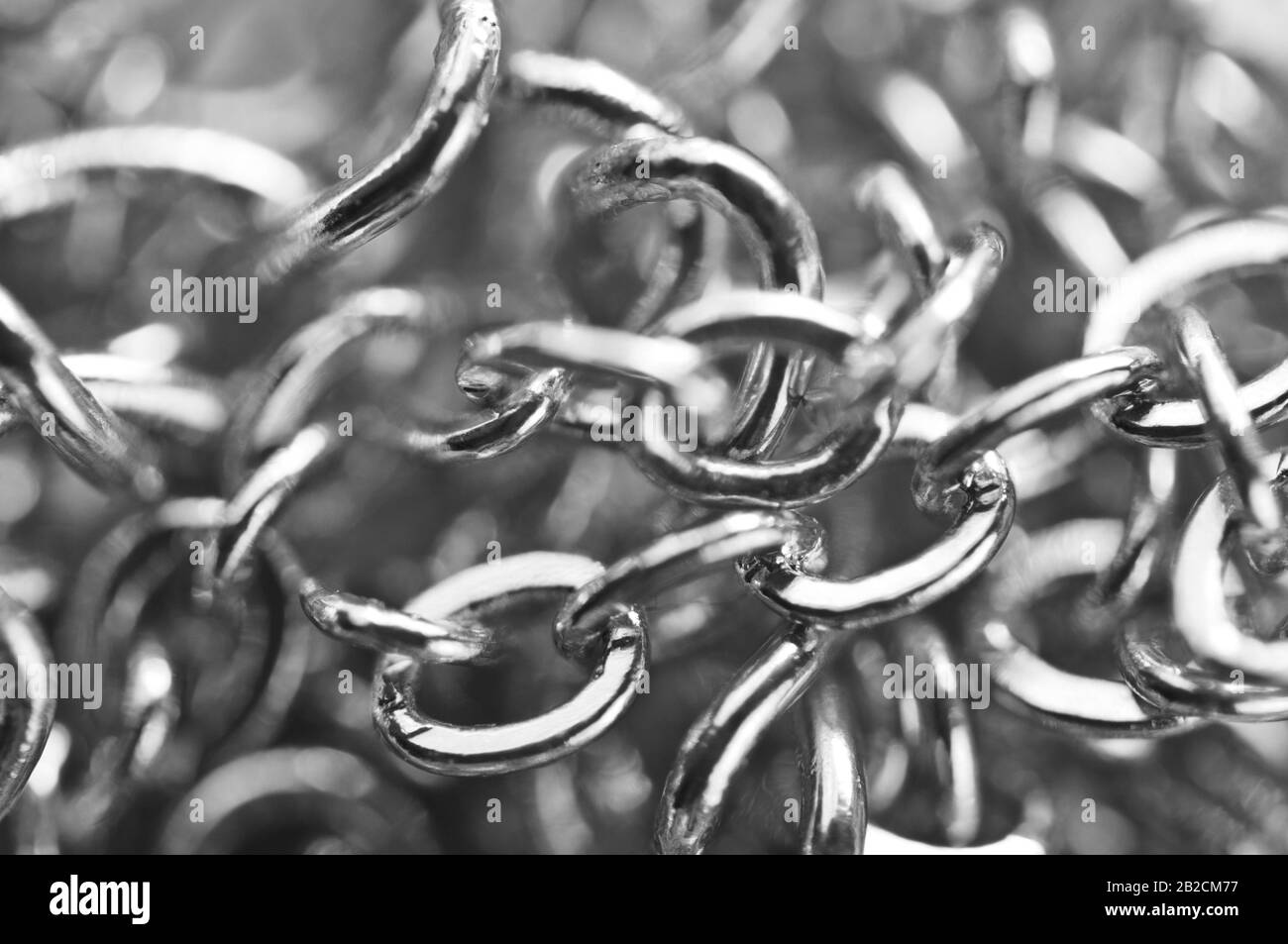 Macro. Le catene fotografiche in bianco e nero si chiudono a schermo intero. Foto Stock