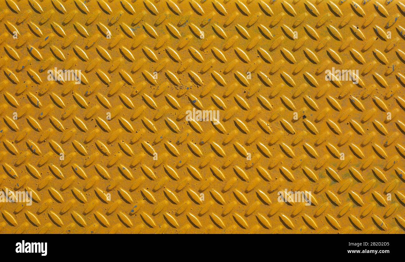 Acciaio giallo placchetta diamantata utili come uno sfondo Foto Stock