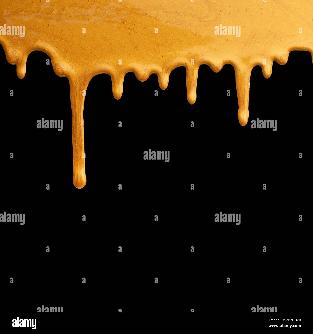 Vernice dorata che gocciola su sfondo nero, cornice creativa Foto Stock
