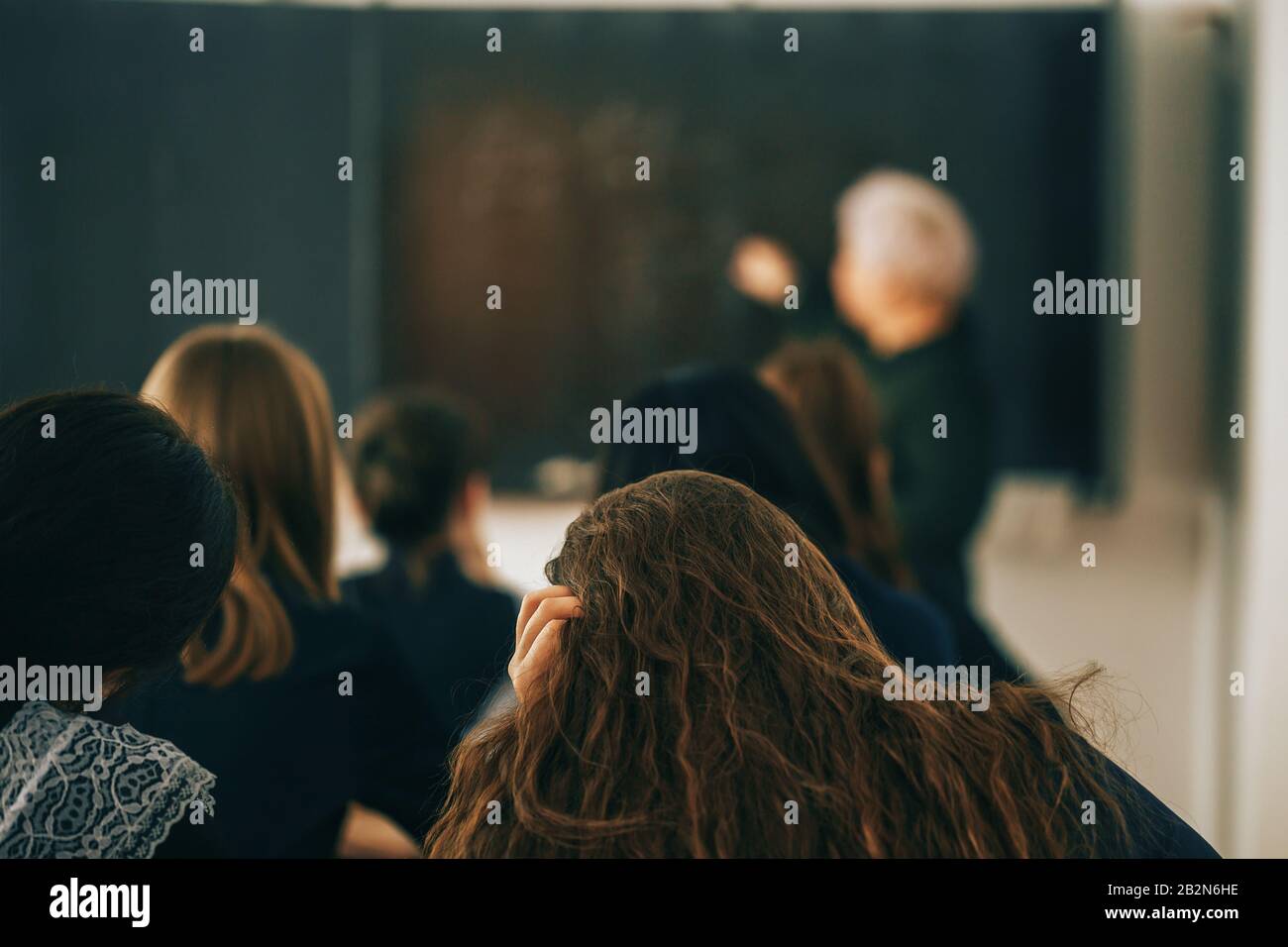 Studenti a scuola in lezione Foto Stock