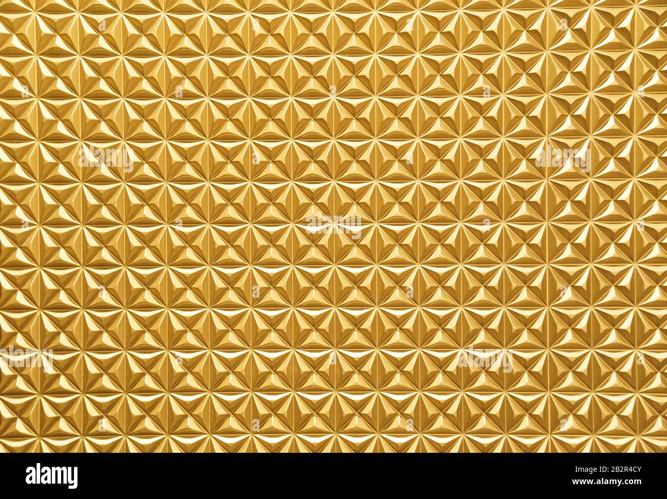 Texture di lusso in metallo dorato delle piastrelle. Modello trendy per lo sfondo del design. Alta risoluzione per sfondi, poster Foto Stock
