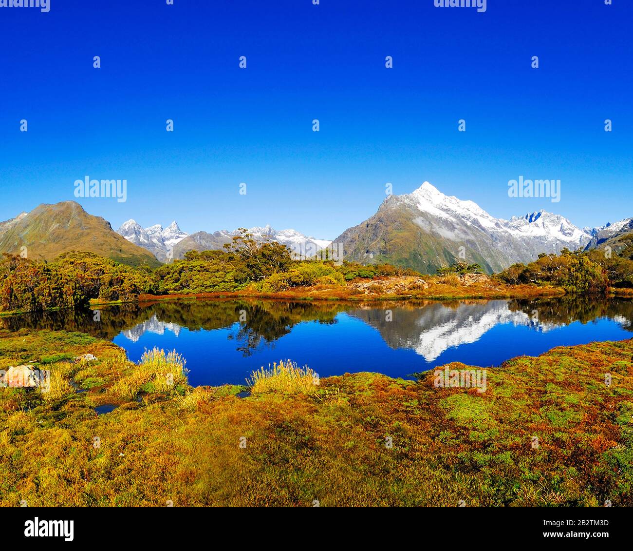 Vertice chiave mit Spiegelung des Mt. Christina, Fjordland Nationalpark, Weltnaturerbe sud ovest della Nuova Zelanda, Westkueste, Suedinsel Neuseeland; Februar Foto Stock