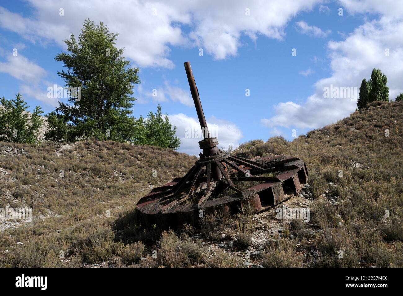 Abbandonati macchinari minerari presso il Earnscleugh Tailings, un sito di dragaggio d'oro vicino alla città di Alexandra, Central Otago. Foto Stock